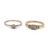 TWO 9CT GOLD AND DIAMOND RINGS (2)