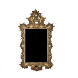 AN ITALIAN ROCOCO STYLE GILT-HEIGHTENED PAINTED MIRROR