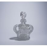 A CUT GLASS OPENWORK CROWN SCENT BOTTLE AND STOPPER