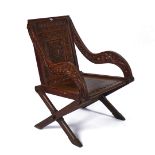 AN OVERSIZED 19TH CENTURY OAK GLASTONBURY CHAIR