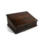 A 17TH CENTURY OAK SLOPE FRONT BIBLE BOX