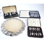A SILVER THREE PIECE CONDIMENT SET AND THREE FURTHER ITEMS (4)