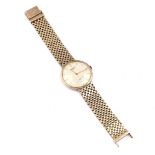 A 14K GOLD LONGINES GENTLEMAN'S BRACELET WRISTWATCH