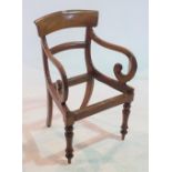 A VICTORIAN MAHOGANY BAR BACK OPEN ARMCHAIR ON TURNED SUPPORTS