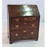 A GEORGE III OAK BUREAU