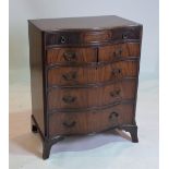 AN 18TH CENTURY STYLE MAHOGANY SERPENTINE CHEST OF DRAWERS