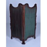 A 19TH CENTURY CARVED MAHOGANY TWO FOLD DRAUGHT SCREEN