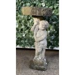 A RECONSTITUTED STONE BIRD BATH