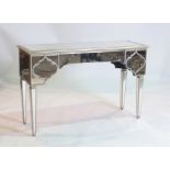 A VENETIAN DESIGN BEVELLED MIRRORED GLASS VENEERED DRESSING TABLE