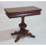 A 19TH CENTURY CONTINENTAL WALNUT FOLD OVER TEA TABLE