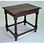 A 17TH CENTURY OAK SIDE TABLE