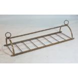 AN EARLY 20TH CENTURY BRASS HANGING PAN RACK