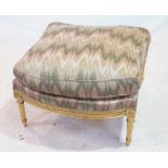 A LOUIS XVI STYLE GILT WOOD FOOTSTOOL