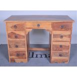 A MODERN HARDWOOD KNEEHOLE WRITING DESK