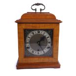 AN ENGLISH WALNUT CASED EIGHT-DAY MANTEL CLOCK BY PERIVALE