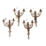 A SET OF FOUR LOUIS XVI STYLE GILT-METAL TWIN LIGHT WALL APPLIQUÉS (4)