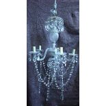 A CUT-GLASS FIVE LIGHT CHANDELIER