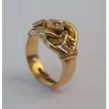 AN 18CT GOLD AND DIAMOND RING