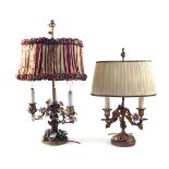 A FRENCH GILT-METAL AND PORCELAIN MOUNTED BOUILLOTTE LAMP AND ANOTHER SIMILAR (2)