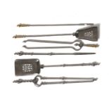A SET OF THREE POLISHED STEEL FIRE TOOLS AND ANOTHER SET (6)