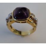 AN 18CT GOLD, AMETHYST AND DIAMOND RING
