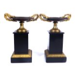 A PAIR OF FRENCH GILT AND PATINATED BRONZE TAZZE