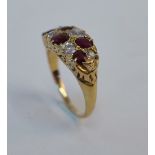 A GOLD, RUBY AND DIAMOND RING