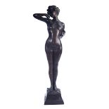 A FRENCH PATINATED BRONZE OF A STANDING FEMALE NUDE