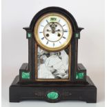 A 19TH CENTURY BLACK SLATE CASED 8-DAY MANTEL CLOCK WITH ENAMEL DIAL AND INLAID MALACHITE...