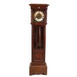 AN EARLY 20TH CENTURY OAK LONGCASE CLOCK