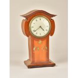 AN ART NOUVEAU MAHOGANY AND INLAID MANTEL TIMEPIECE