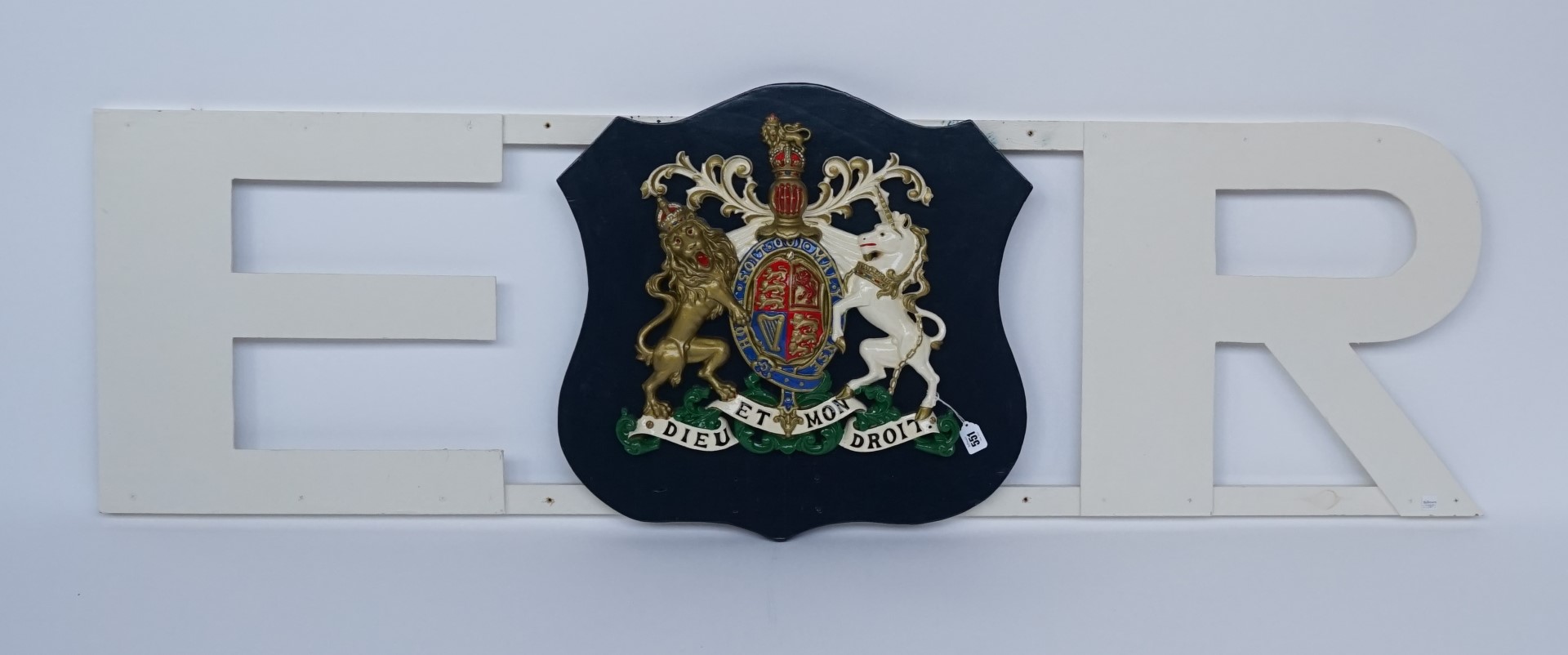 A QUEEN ELIZABETH II PAINTED ALLOY ROYAL COAT-OF-ARMS