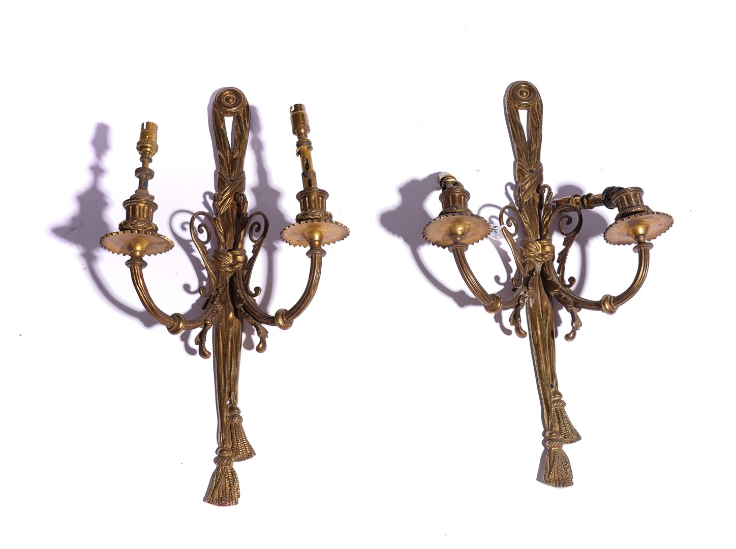 A PAIR OF LOUIS XVI STYLE GILT BRASS TWIN LIGHT WALL APPLIQUÉS