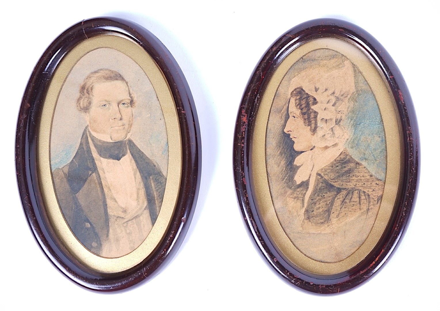 JOHN FAED: A PAIR OF OVAL WATERCOLOUR PORTRAITS