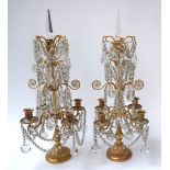 A PAIR OF LOUIS XVI SWEDISH STYLE ORMOLU AND CUT AND GLASS MOUNTED FOUR-LIGHT CANDELABRA (2)