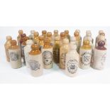 A QUANTITY OF EARLY 20TH CENTURY STONEWARE BOTTLES, VARIOUS LOCATIONS AND BREWERIES (QTY)