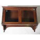 AN EDWARDIAN MAHOGANY HANGING DISPLAY CABINET