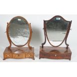 A GEORGE III INLAID MAHOGANY TOILET MIRROR WITH THREE DRAWER BASE (2)