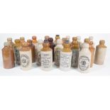 A QUANTITY OF EARLY 20TH CENTURY STONEWARE BOTTLES, VARIOUS LOCATIONS AND BREWERIES (QTY)