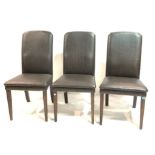 A SET OF TWELVE MODERN DARK BROWN LEATHER DINING CHAIRS (12)