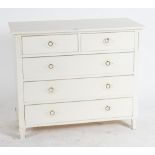 A MODERN WHITE PAINTED CHEST OF DRAWERS