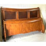 A MODERN OAK KINGSIZE SLEIGH BED