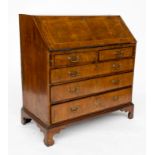 AN 18TH CENTURY FIGURED WALNUT INALID BUREAU