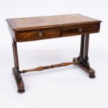 A GEORGE IV ROSEWOOD WRITING TABLE ON GILT BRASS RAILED END SUPPORTS