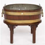 A MID-18TH CENTURY COOPERED OAK WINE COOLER ON STAND