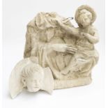 A LARGE PLASTER ORNAMENT OF A MOTHER AND CHILD WITH ANOTHER CHERUB HEAD (2)