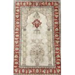 A SILK HEREK PRAYER RUG, TURKISH