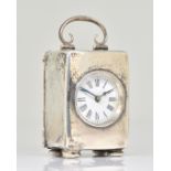 A SILVER CASED RECTANGULAR SMALL CARRIAGE CLOCK TIMEPIECE