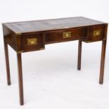 A CAMPAIGN STYLE BRASS MOUNTED MAHOGANY DESK