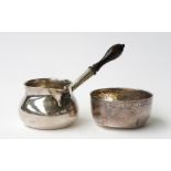 AN EARLY GEORGE II SILVER BRANDY SAUCEPAN AND A FOREIGN BOWL (2)